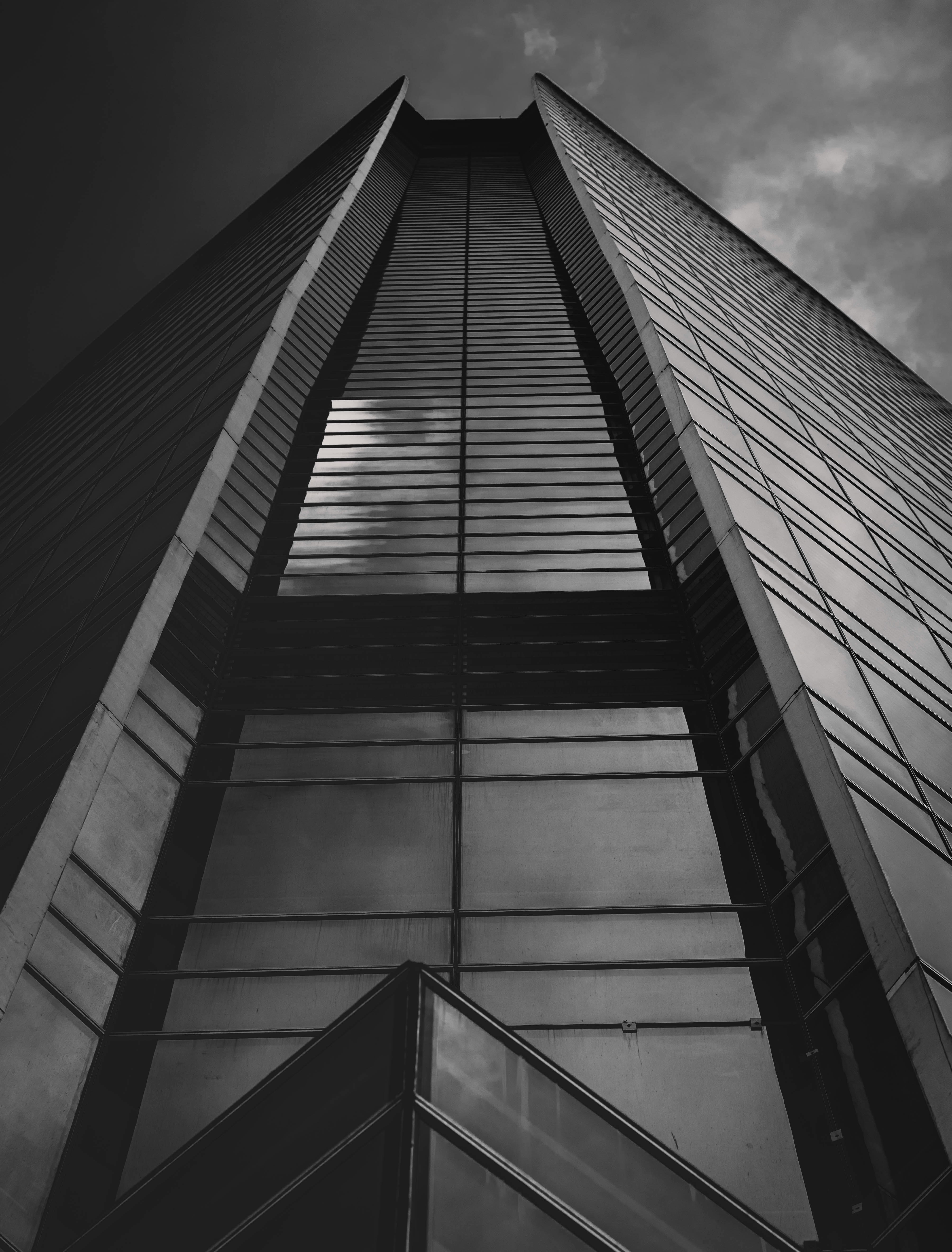 grayscale photo of high rise building